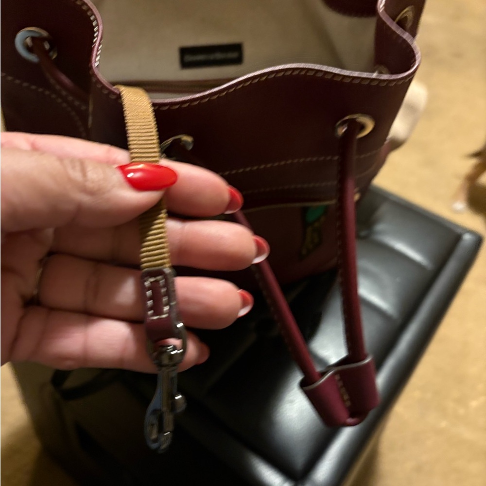 Dooney and Burke Drawstringng Backpack in color Grape. - Picture 5 of 12